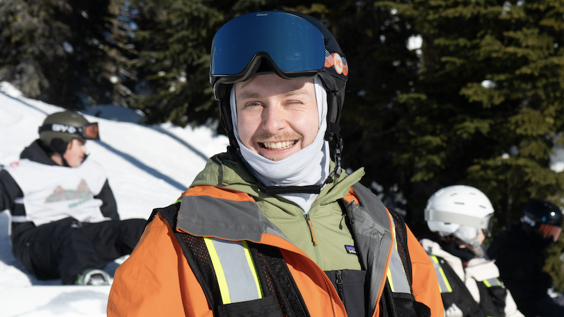 A photo of a snowboarder wearing an Elevation Outdoors vest